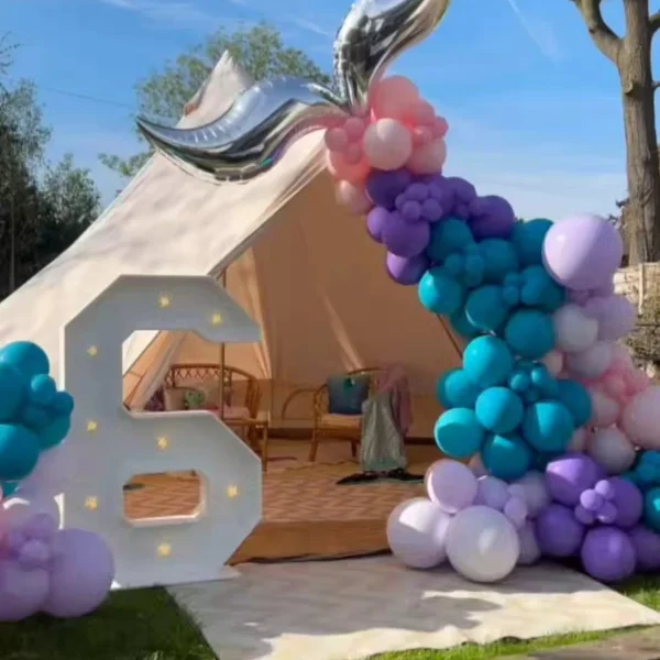 bell-tent-glamping-hire-essex-unicorn-balloon-garland-setup